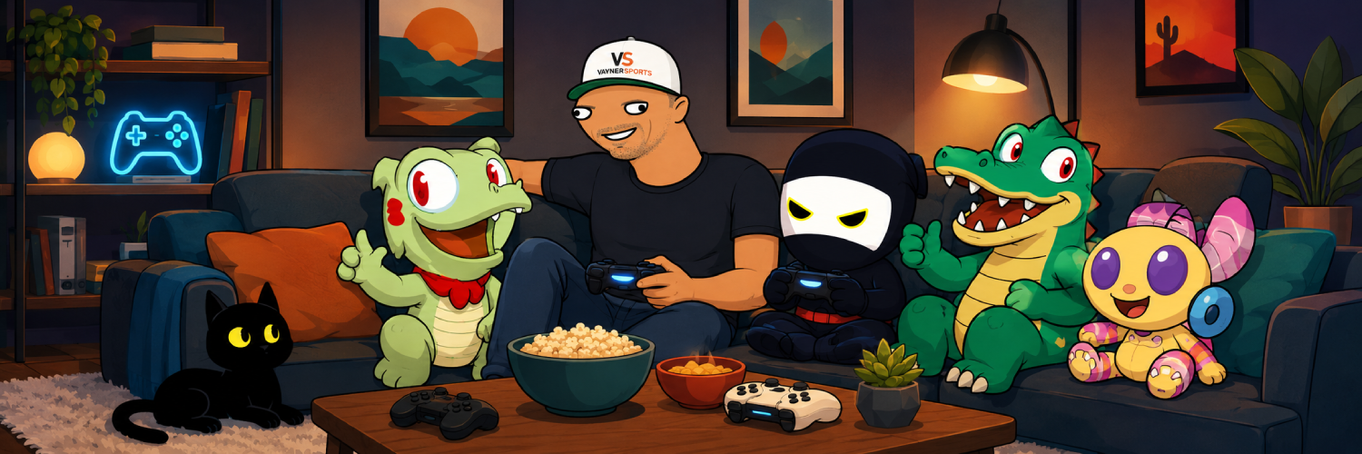 Gery playing video games on a couch surrounded by his cartoon frens and a black cat, with popcorn on the table